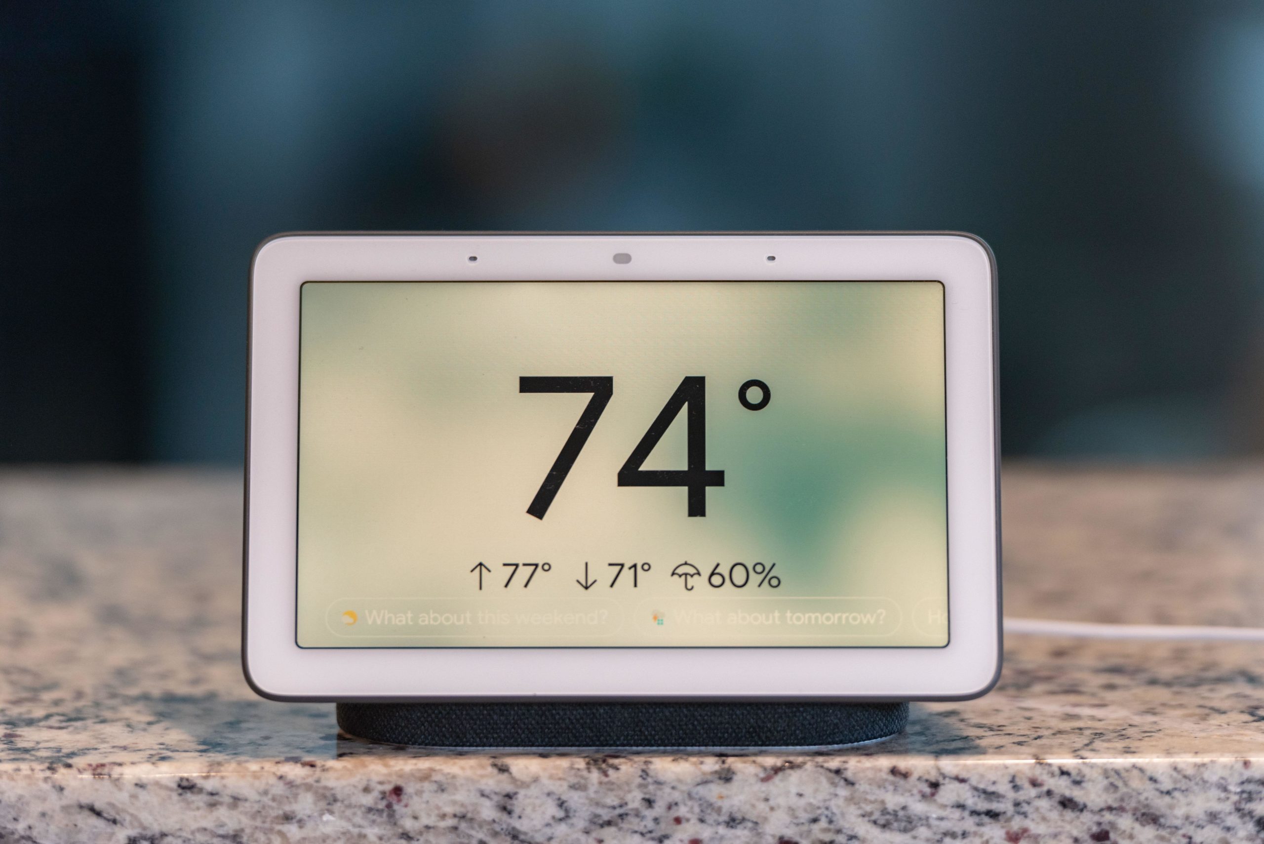 Google Home Hub Smart Speaker Displaying the Weather