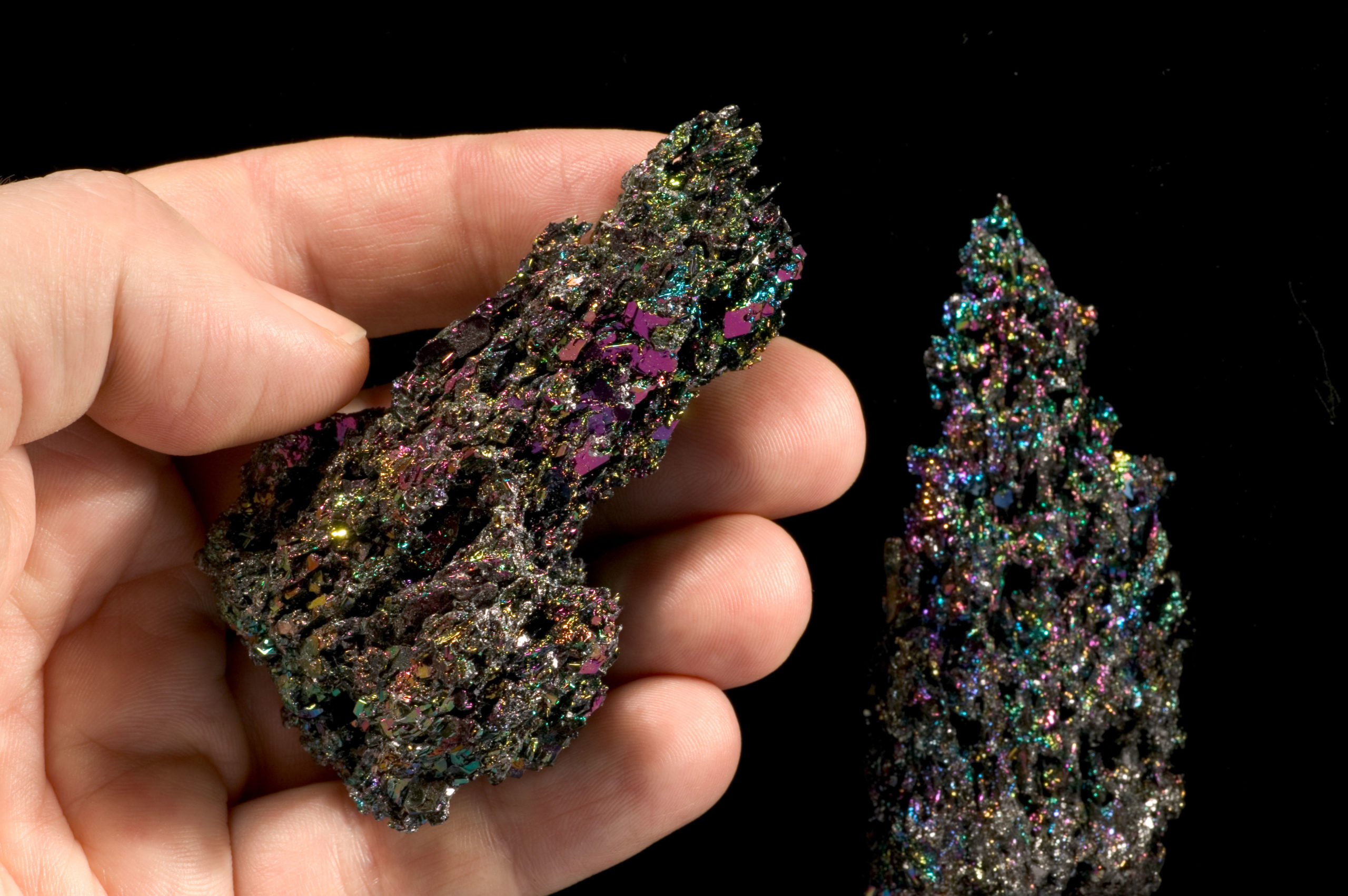 Hand holding silicon Carbide Crystals