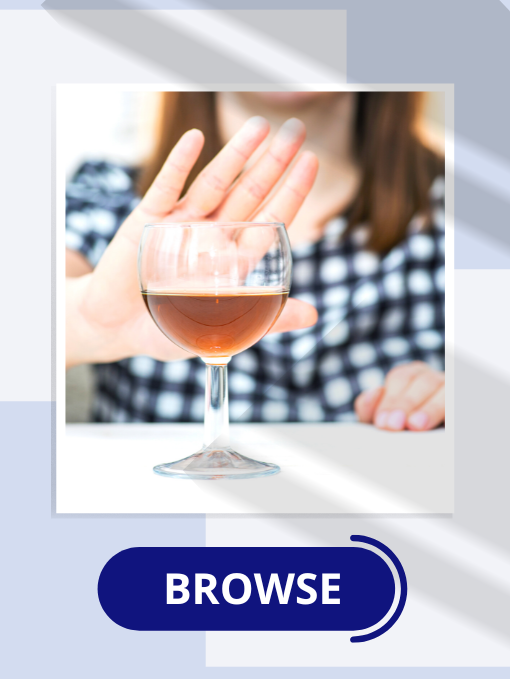 Woman's hand pushing glass of alcohol away from her.