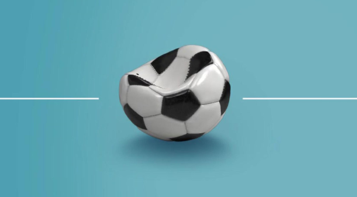 Image of a partially deflated soccer ball against a light blue background with the Taylor & Francis logo in the top corner.
