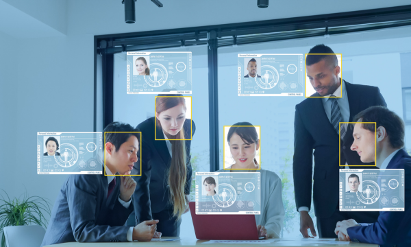 Facial recognition of five colleagues in an office