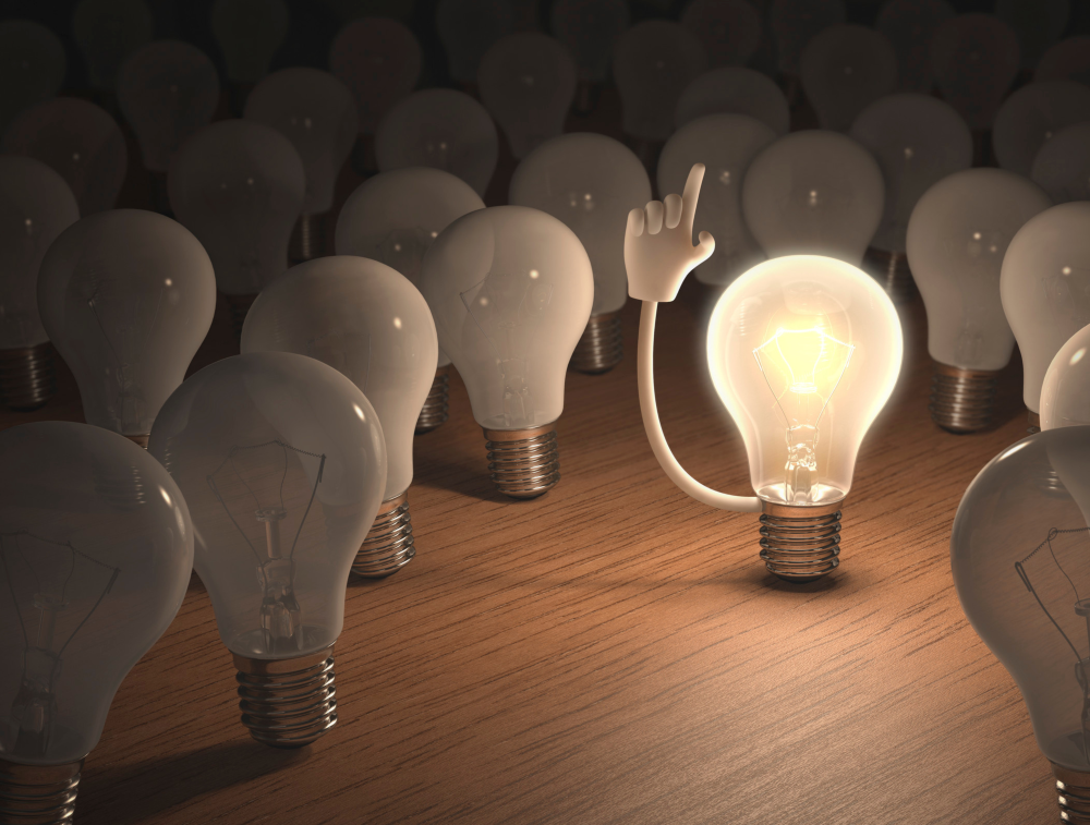 lightbulb with finger pointed in air