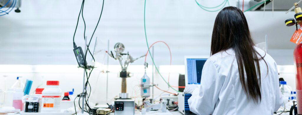 Researcher conducting an experiment in a lab.