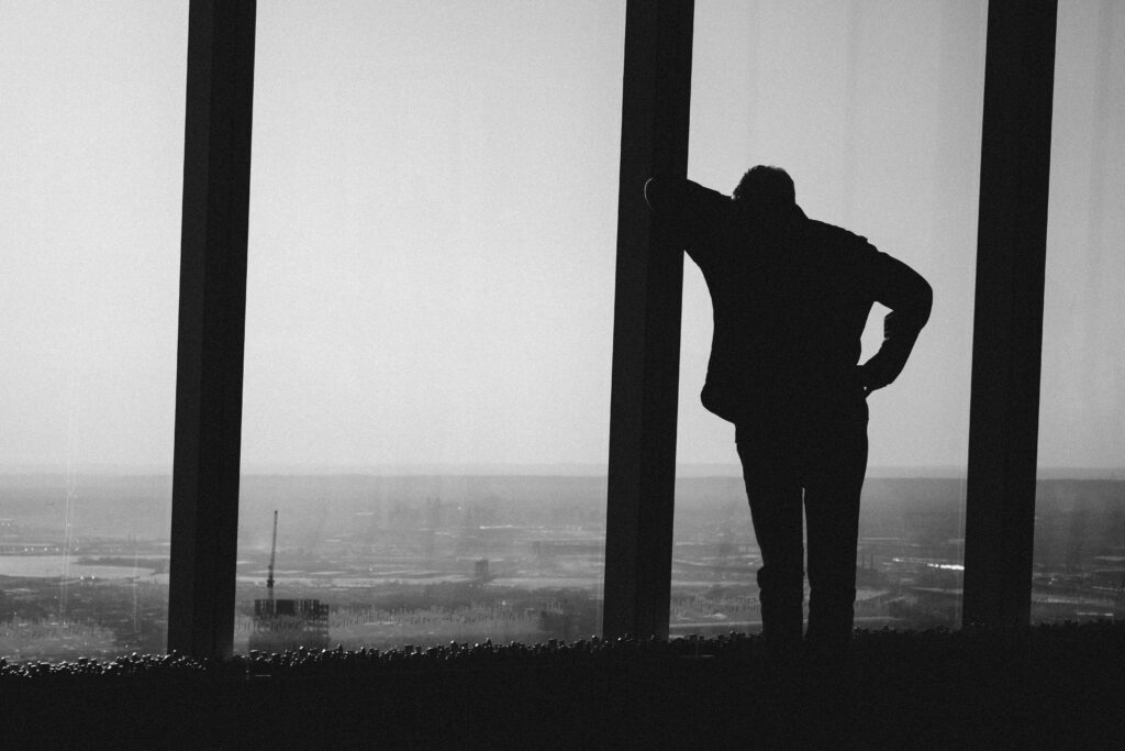 Person leaning and thinking. 