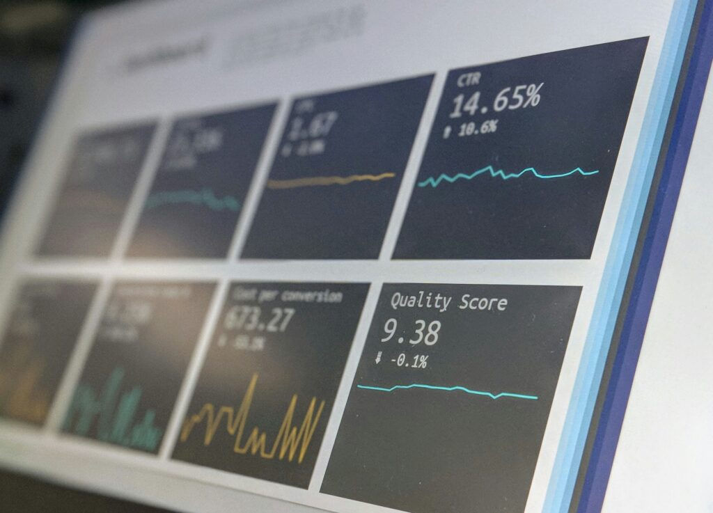 Line charts and statistics on a screen. 